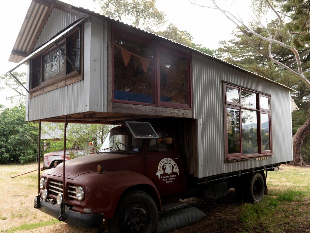 Rob Scott has built six tiny houses, this one he sourced stained glass and other supplies from eBay. Picture: Kylie Else