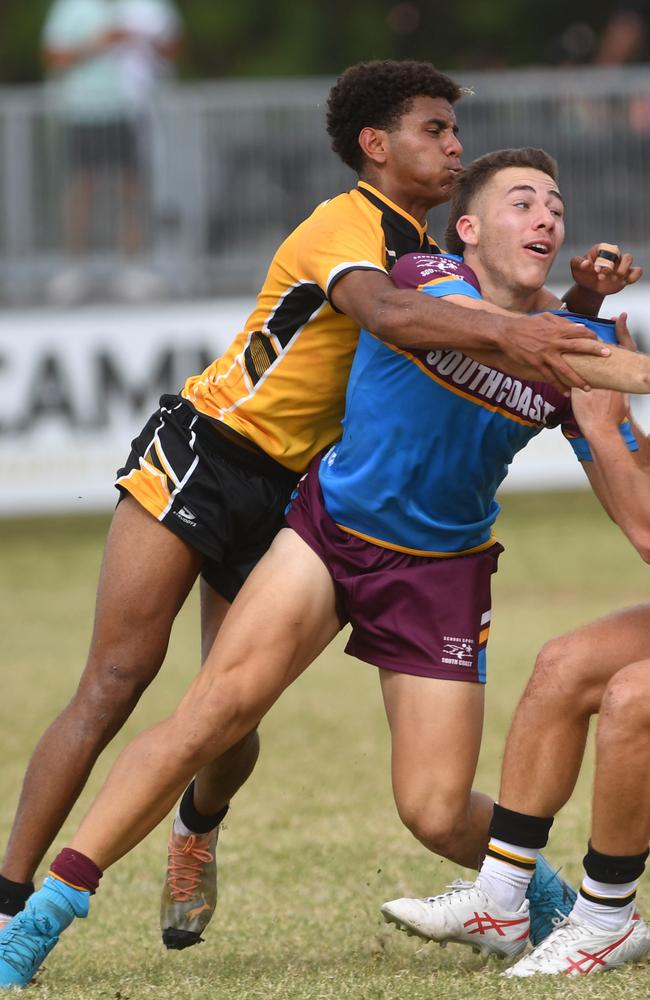 Mutua Brown tackling Sam Stephenson.