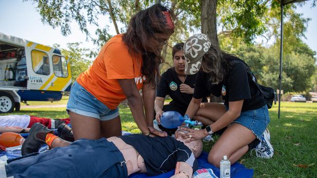 Tish Sivagnanan, Minhal Gill and Shreya Mago medical students demonstrate CPR and Emergency skills at the CareFlight training center as part of the AMSA Rural Health summit at Fort Hill Parkland, Darwin