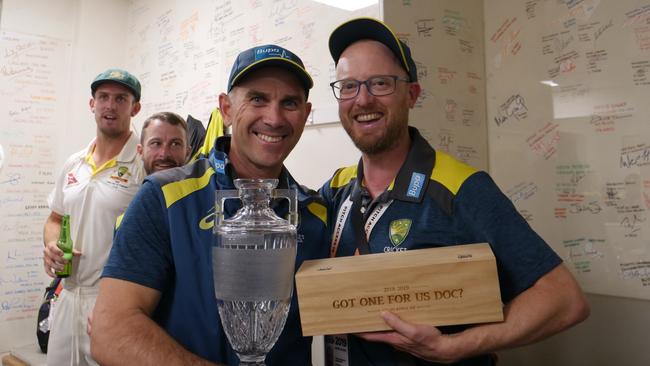 Justin Langer with a gift for Doc.