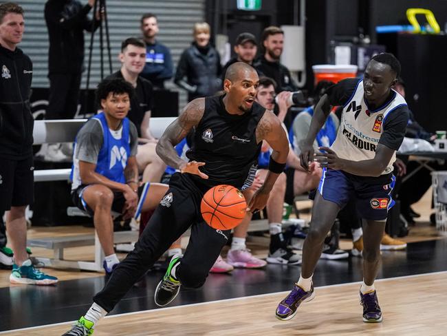 Xavier Rathan-Mayes turns on the jets — he’s helped his two new mates settle in. Picture: Melbourne United Media