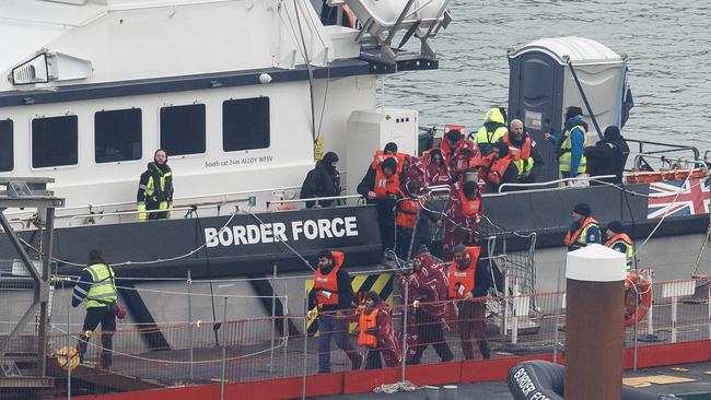 Migrants are brought ashore in Dover after being picked up in the English Channel by a Border Force vessel on Wednesday. Picture: Getty Images