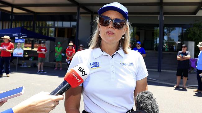 LNP Candidate Bree James gets questioned at Tjapukai pre poll in Cairns. Pics Adam Head