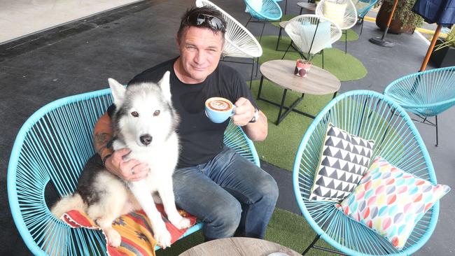 Raw Espresso owner Mark Fannin with his late Siberian Husky, Si. Picture: Richard Gosling