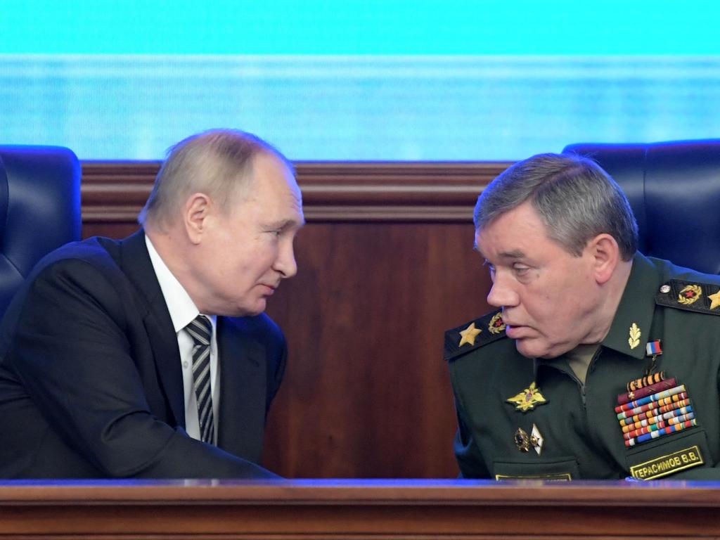 Vladimir Putin listens to Chief of the General Staff of the Russian Armed Forces Valery Gerasimov during the annual meeting of the Defence Ministry board in Moscow on December 21, 2021. Picture: Sergei Guneyev/Sputnik/AFP