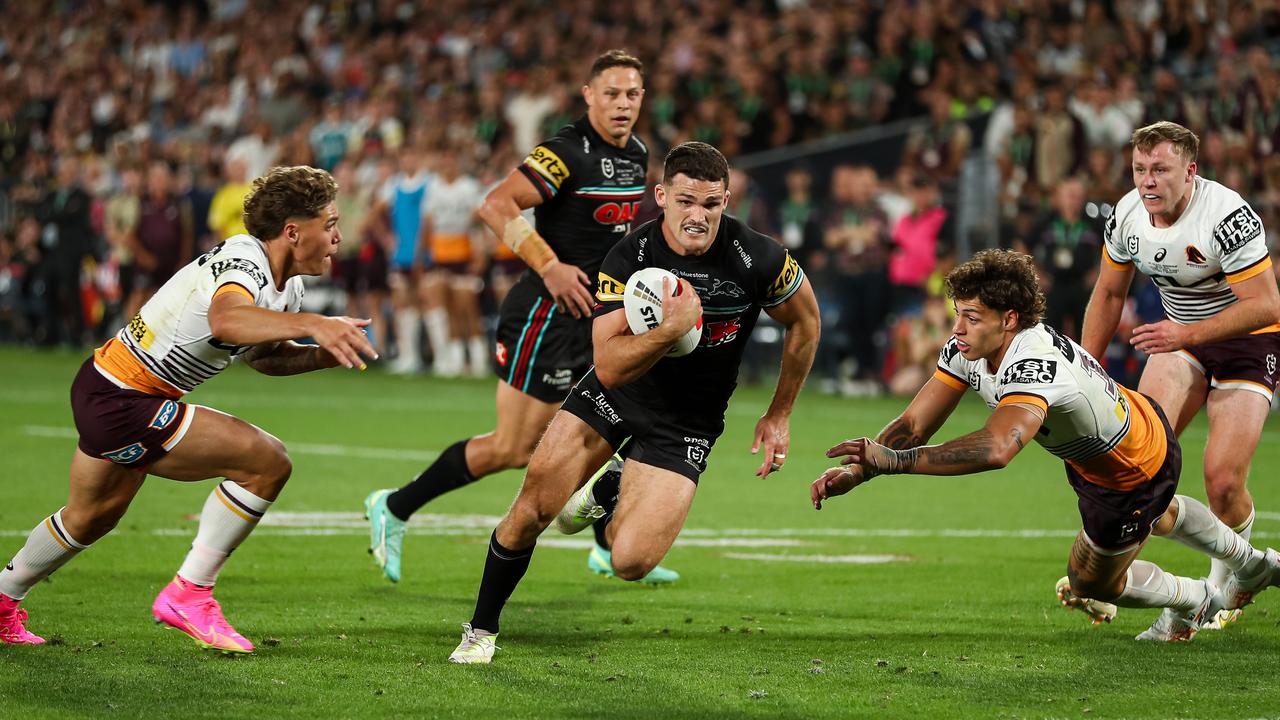 Nathan Cleary splits the Broncos defence during the NRL decider.