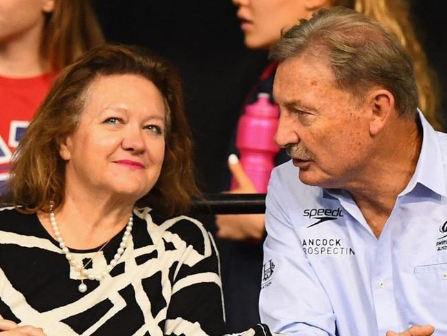 Billionaire Gina Rinehart with John Bertrand, the president of Swimming Australia.