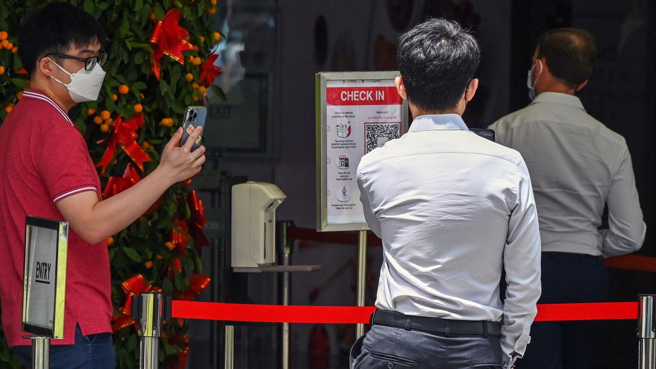 QR check-ins eventually served no purpose. Picture: Roslan Rahman/AFP