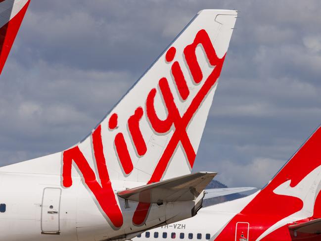 Townsville, Queensland - 28 July 2021: Virgin Australia and Qantas tails on display at Townsville Airport in far North Queensland27 October 2024Kendall HillPhoto - Getty Images