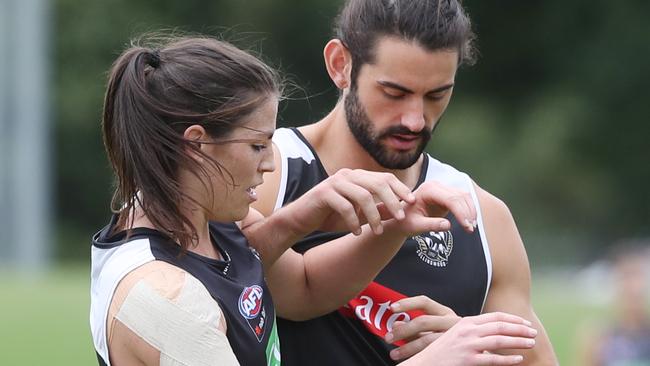 Eliza Hynes and Brodie Grundy at Collingwood training. Picture: David Crosling