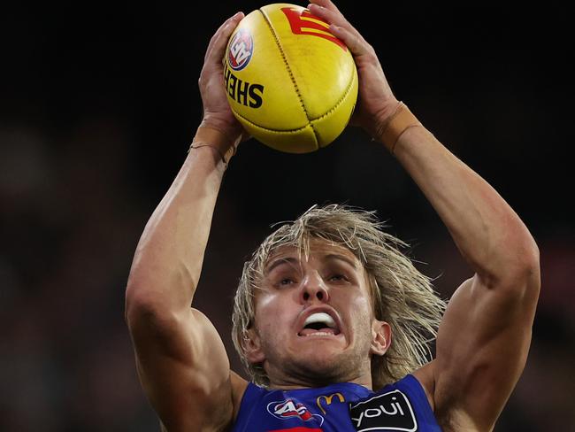 MELBOURNE, AUSTRALIA - AUGUST 17: Kai Lohmann of the Lions marks the ball during the round 23 AFL match between Collingwood Magpies and Brisbane Lions at Melbourne Cricket Ground, on August 17, 2024, in Melbourne, Australia. (Photo by Daniel Pockett/Getty Images)