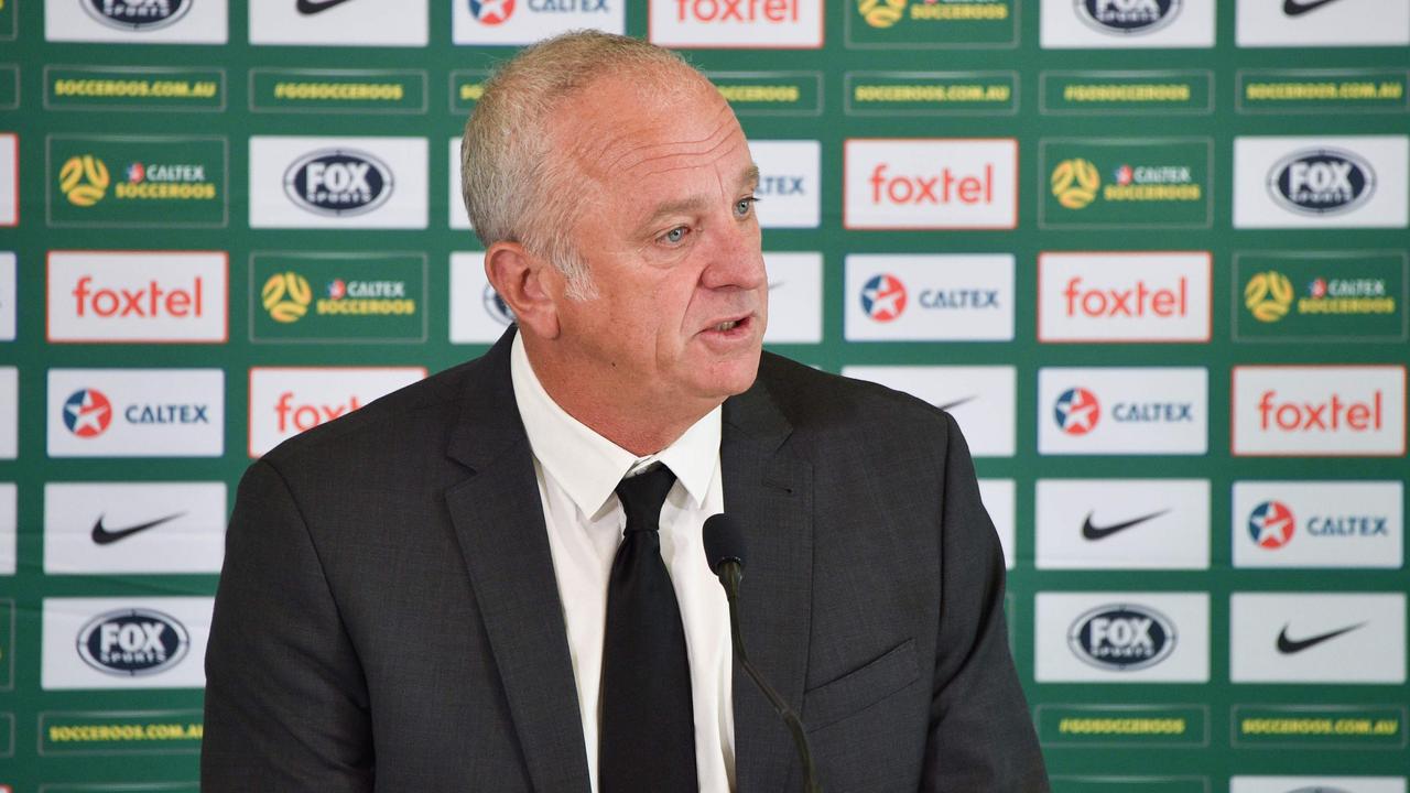 Australia's football coach Graham Arnold answers a question after announcing the Socceroos squad to defend their Asian Cup title at a press conference in Sydney on December 20, 2018. (Photo by PETER PARKS / AFP) / -- IMAGE RESTRICTED TO EDITORIAL USE - STRICTLY NO COMMERCIAL USE --