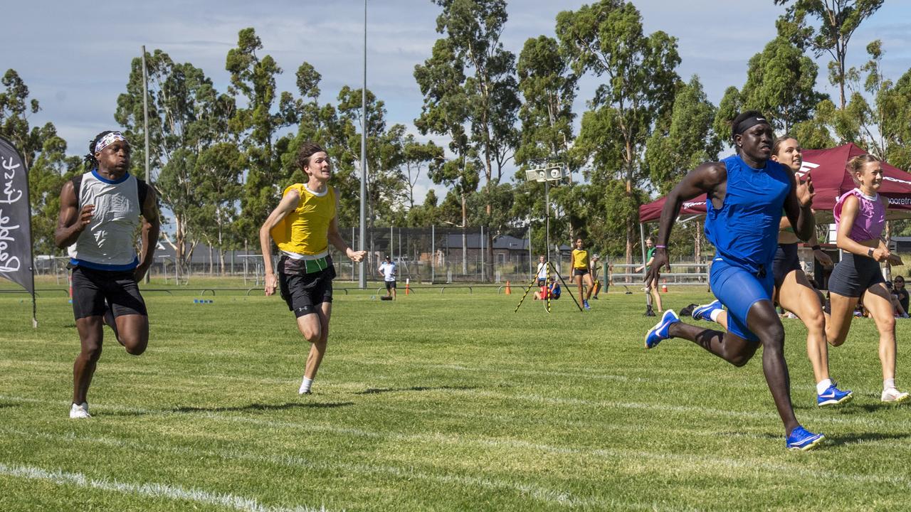 Anas Abu Ganaba (in blue) winner of the Moore Trailers 120 metres open. at the Arthur Postle Gift in Pittsworth. Saturday 18th January, 2025. Picture: Nev Madsen.