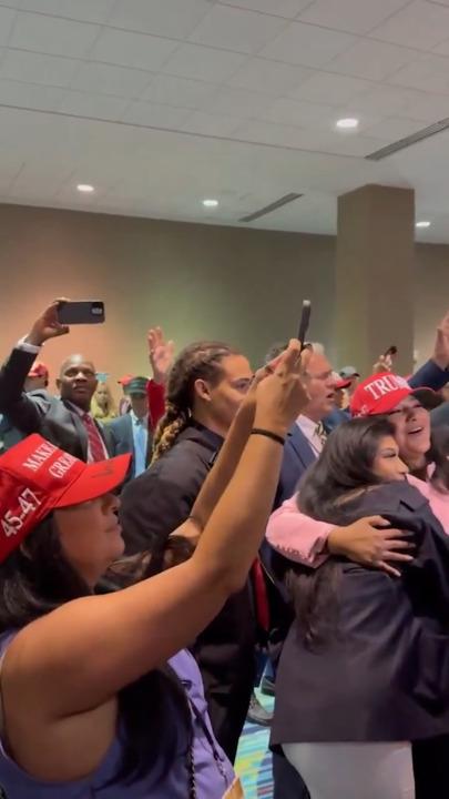 Trump supporters start singing a hymn after victory