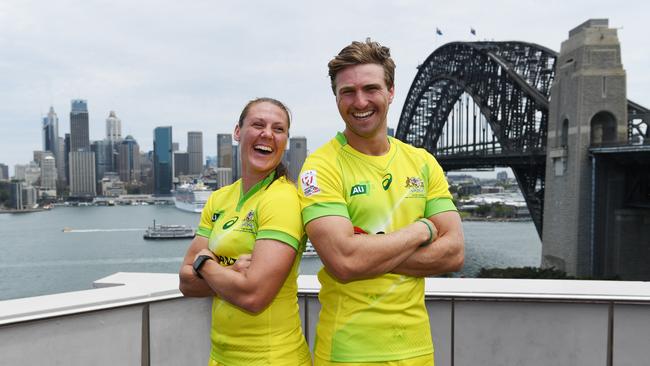 Australian sevens captains Sharni Williams and Lewis Holland pose in Sydney.