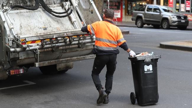 MELBOURNE, AUSTRALIA - NewsWire Photos, APRIL 13, 2024. Generic worker images. A garbage collector in Melbourne CBD.  Picture: NCA NewsWire / David Crosling