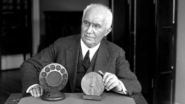 Emile Berliner in 1927 with the microphone he invented. US Library of Congress public domain