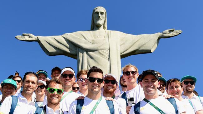 The Australian men’s hockey team pose in front of the Christ the Redeemer statue in Rio.