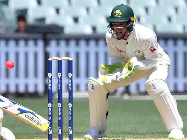 Tim Paine keeps wicket for the CA XI.