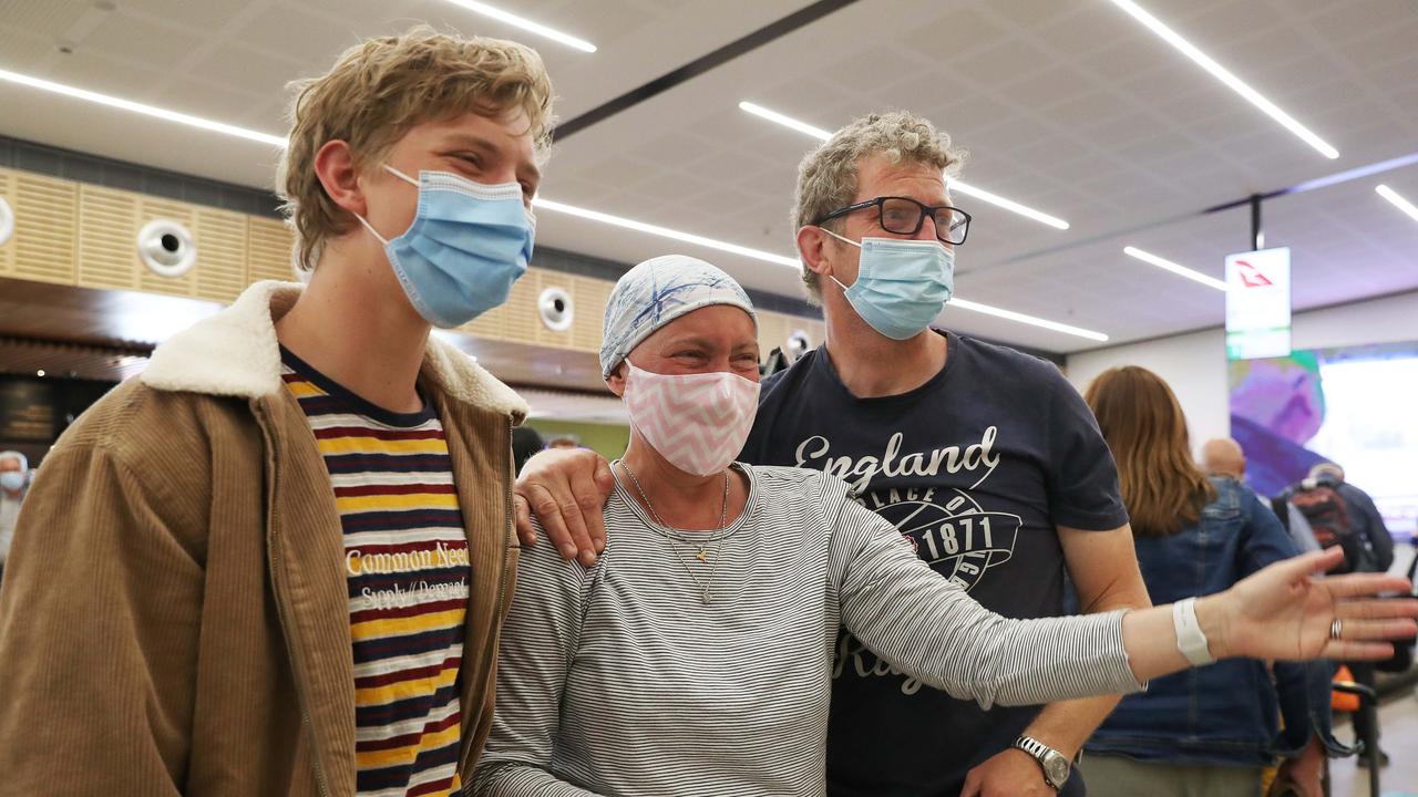 Kate Robertson who has been diagnosed with terminal cancer with son Noah and partner Nic Robertson waiting to meet her parents and two sisters who were arriving from the United Kingdom to see each other after 3 1/2 years. Picture: Nikki Davis-Jones