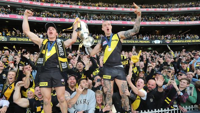 Liam Baker and Dustin Martin with the Premiershp Cup. Picture: Alex Coppel.