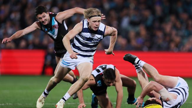 Zach Guthrie hunts the ball. Picture: James Elsby/AFL Photos via Getty Images