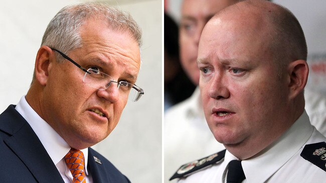 Prime Minister Scott Morrison and NSW RFS Commissioner Shane Fitzsimmons. Picture: AAP