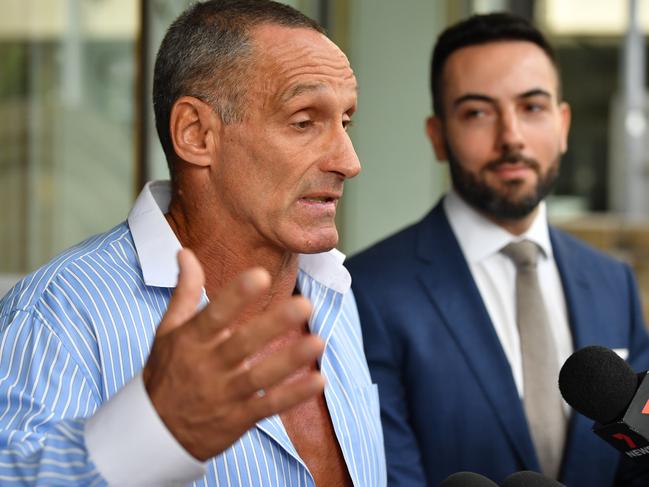 Dimitri Moskovich (left) speaks to media as he leaves the Downing Centre Court in Sydney. Picture: NCA NewsWire/JOEL CARRETT