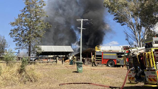 Explosions could be heard across the Mary Valley as emergency crews rushed to contain a large shed fire housing multiple classic bikes and cars. Picture: Scott Kovacevic