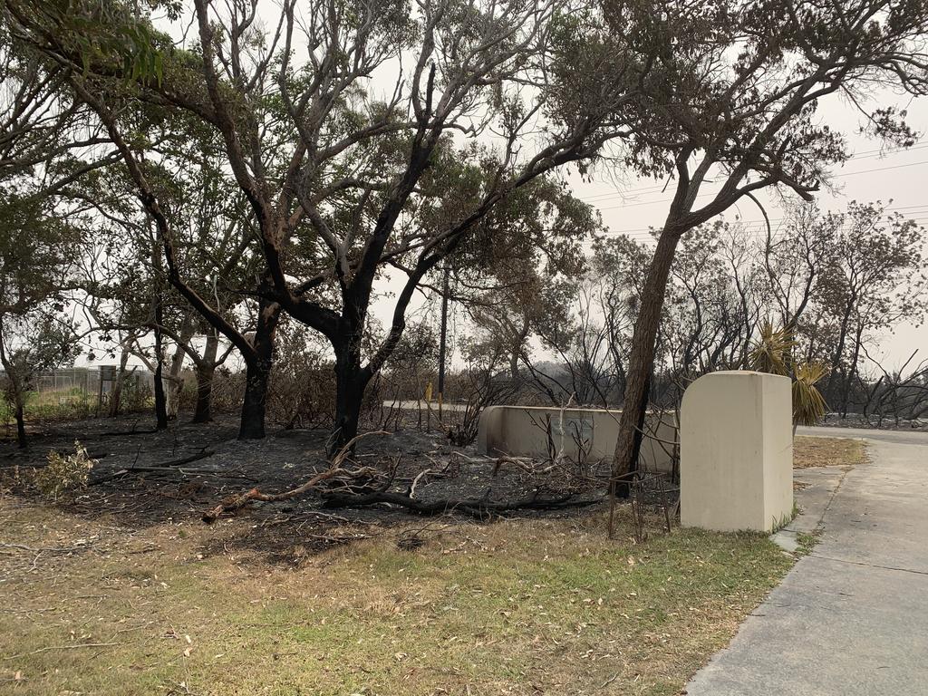 A section of the family’s property that flames got to before they were put out. Picture: James Hall