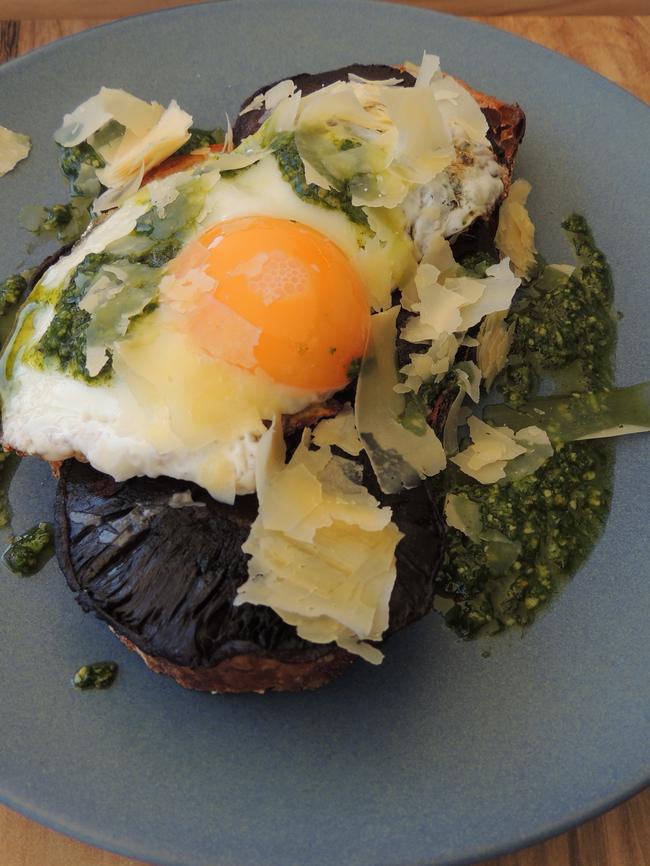 Portbello mushrooms, fried egg, basil pesto and parmesan Reggiano ($10).