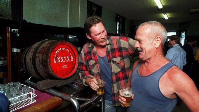 Builders Greg Piesse and Allan Nugent having a beer, pulled from a wooden keg, at Brisbane's Breakfast Creek Hotel, in July, 1998.