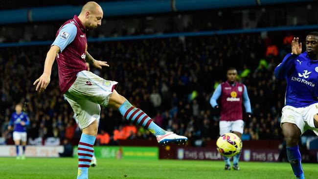 Alan Hutton of Villa shoots to score the winning goal during the Barclays Premier League match between Aston Villa and Leicester City at Villa Park.