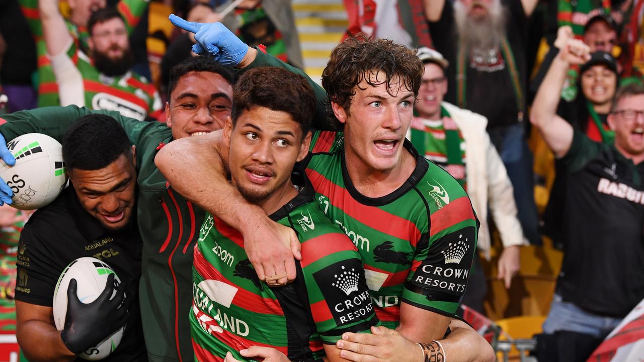 BRISBANE, AUSTRALIA - SEPTEMBER 24: Jaxson Paulo of the Rabbitohs celebrates with teammates after scoring a try during the NRL Preliminary Final match between the South Sydney Rabbitohs and the Manly Sea Eagles at Suncorp Stadium on September 24, 2021 in Brisbane, Australia. (Photo by Bradley Kanaris/Getty Images)