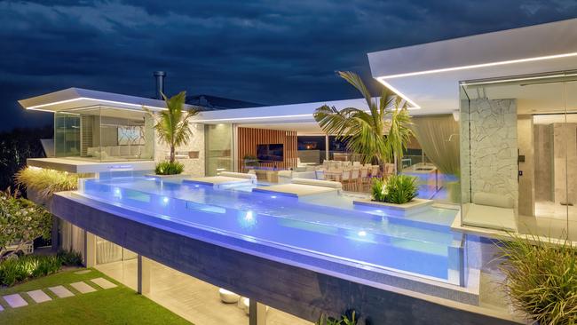 The stunning home of award-winning building designer Chris Clout – Driftwood House in Castaways Beach, Qld – is for sale.