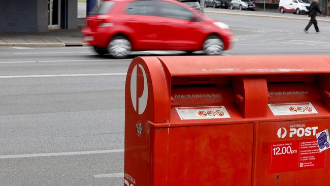 Posties will now only deliver letters to one half of their route each day. Picture: NCA NewsWire / Kelly Barnes