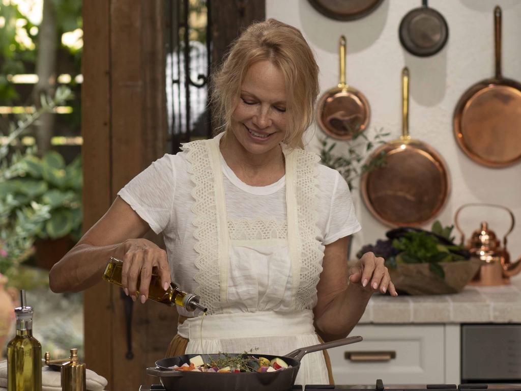 Pamela Anderson in chef mode in Pamela's Cooking With Love.