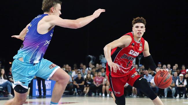 LaMelo Ball drives to the ring against Finn Delany.