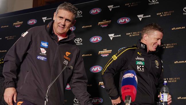 The coaches … GWS boss Leon Cameron (left) and Tigers head coach Damien Hardwick. Picture: AAP