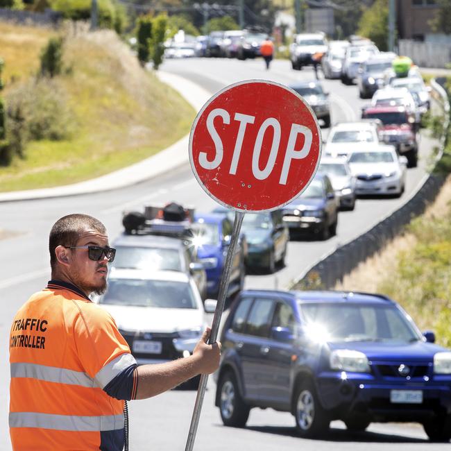 Traffic controllers directing vehicles on the Channel Highway at Kettering. Picture: CHRIS KIDD