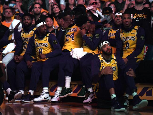 LeBron James and Quinn Cook cry during the Los Angeles Lakers pre-game ceremony to honour Kobe Bryant. Picture: Harry How/Getty Images