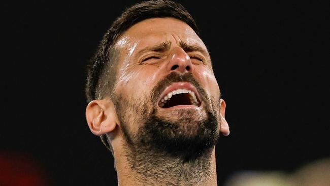 Serbia's Novak Djokovic celebrates victory against Czech Republic's Tomas Machac during their men's singles match on day six of the Australian Open tennis tournament in Melbourne on January 17, 2025. (Photo by Martin KEEP / AFP) / -- IMAGE RESTRICTED TO EDITORIAL USE - STRICTLY NO COMMERCIAL USE --