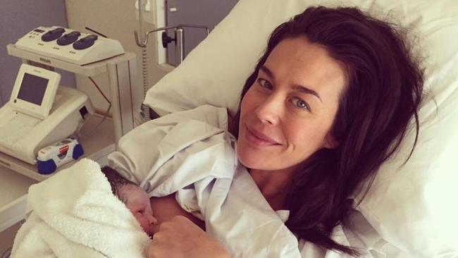 Megan Gale and her new baby girl Rosie May Dee Hampson with partner Shaun Hampson. Pic: Instagram