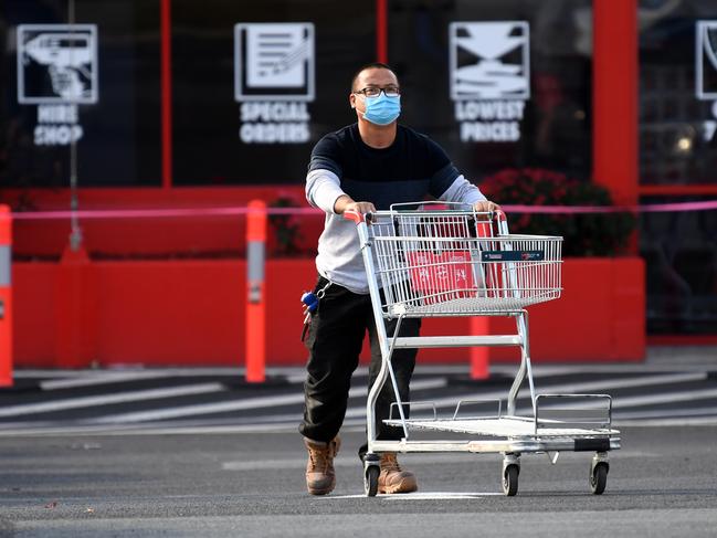 BRISBANE, AUSTRALIA - NCA NewsWire Photos AUGUST, 04, 2020:A customer wears a face mask at the car park of the Bunnings Mt Gravatt store in BrisbaneÃs south.Picture: NCA NewsWire / Dan peled