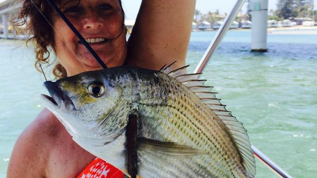 Michelle Bell, 48, of Freemans Reach, landed a 42cm bream that many locals believe is the biggest in living memory. Picture: Supplied
