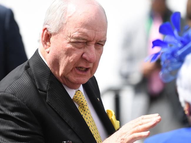 Alan Jones (left) is seen in the Lexus marquee during the Kennedy Oaks Day, as part of the Melbourne Cup Carnival, at Flemington Racecourse in Melbourne, Thursday, November 8, 2018. (AAP Image/Julian Smith) NO ARCHIVING, EDITORIAL USE ONLY