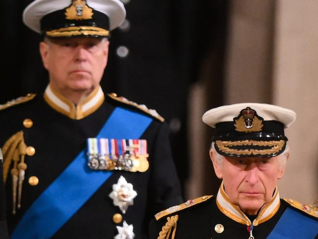 LONDON, ENGLAND - SEPTEMBER 16: King Charles lll, Prince Andrew, Duke of York and Prince Edward, Earl of Wessex attend a vigil, following the death of Queen Elizabeth ll, inside Westminster Hall on September 16, 2022 in London, England. Queen Elizabeth II's children mount a family vigil over her coffin lying in state in Westminster Hall. Queen Elizabeth II died at Balmoral Castle in Scotland on September 8, 2022, and is succeeded by her eldest son, King Charles III. (Photo by Daniel Leal - WPA Pool / Getty Images)