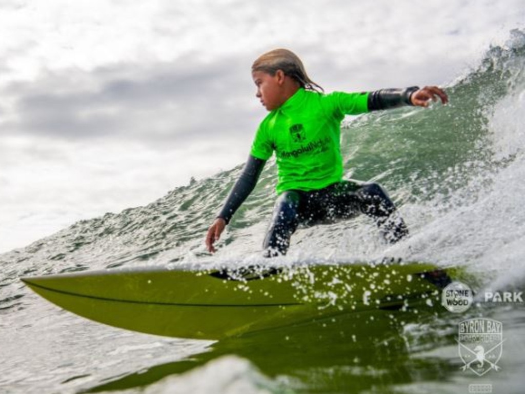 Jonny Tooth surfing