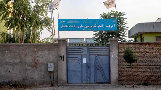 The Taliban flag flutters over a provincial branch building of National Radio Television of Takhar (RTA) in Taloqan, capital of northeastern Takhar province. Picture: AFP