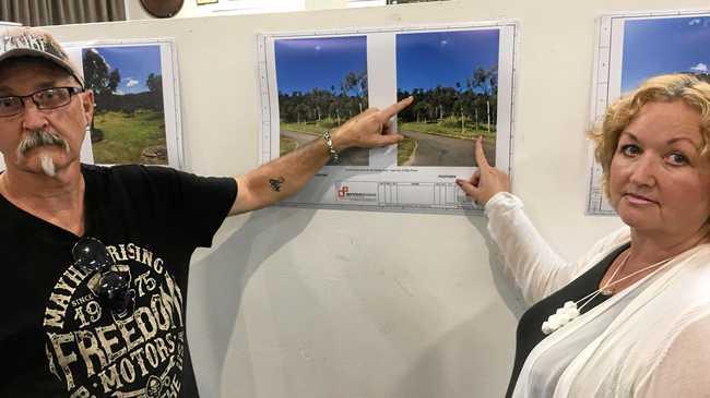 NOT HAPPY: John Emmett points to the proposed location of the Telstra mobile base station, as his wife Tracy Emmett points to their Mila Drive property 300m from the site. Picture: Tamera Francis